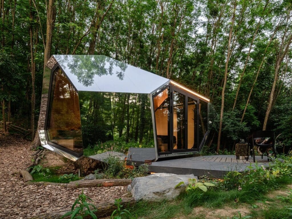 PEBL Grand multi-faceted cabin in a natural setting
