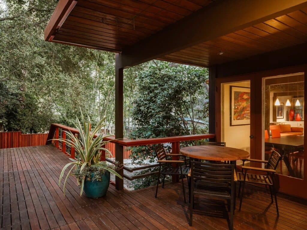 Norton House facade along a natural water stream