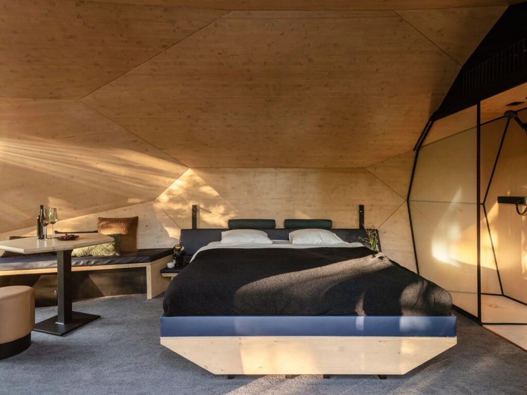 PEBL Grand multi-faceted cabin in a natural setting