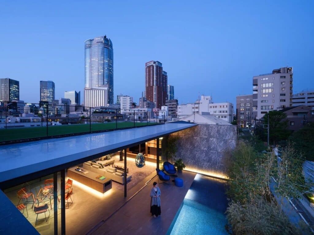 Architectural details highlighting the contrast between concrete exterior and wooden interior.