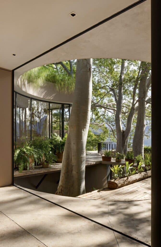 Casa Santa Maria del Oro architectural design on lakeside, blending modern architecture with natural surroundings