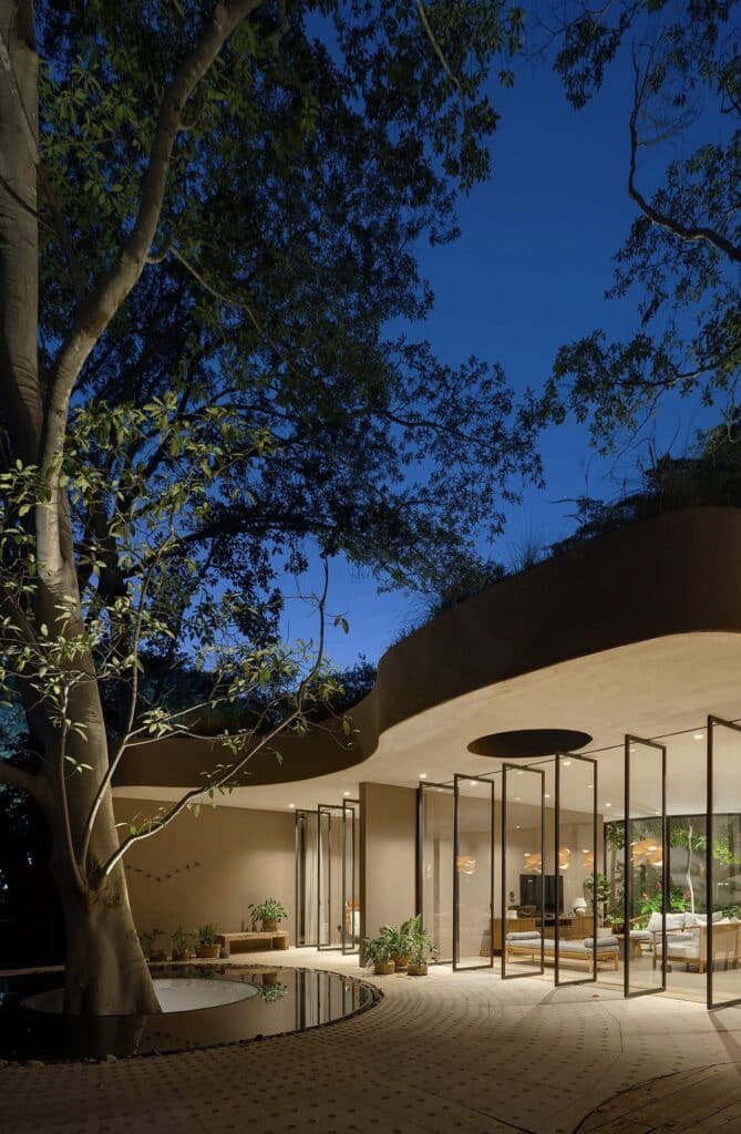 Casa Santa Maria del Oro architectural design on lakeside, blending modern architecture with natural surroundings