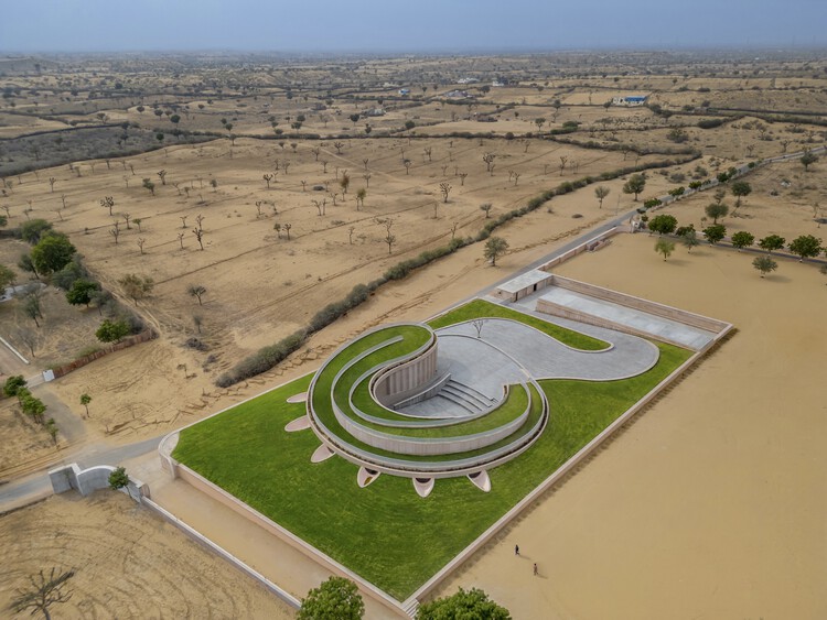Curved façade of Nokha Community Centre in the Rajasthan desert