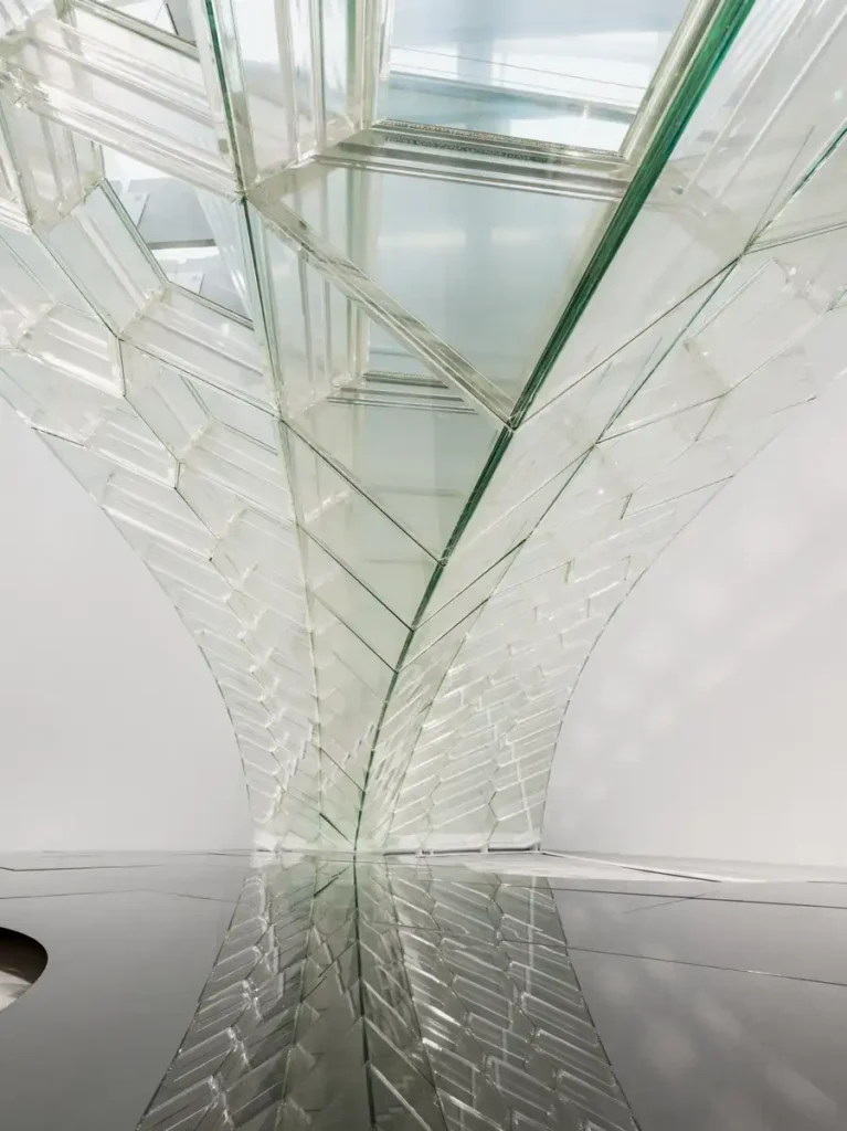 Modular glass pedestrian bridge in Philadelphia showing the curved ultra-thin glass elements