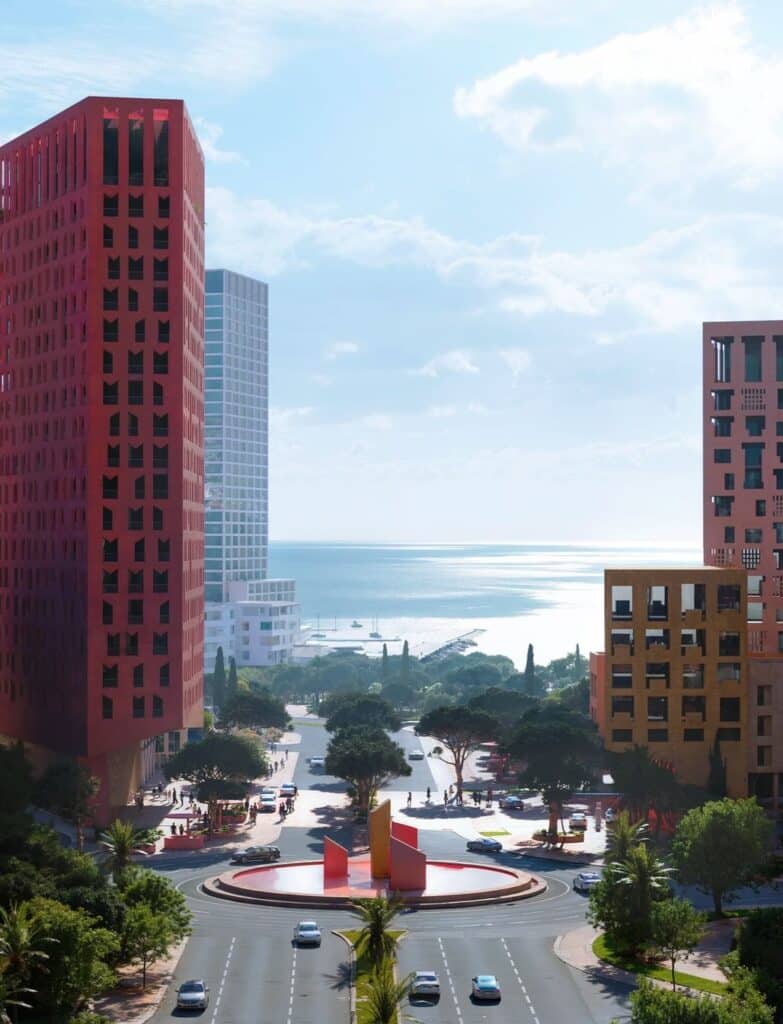 The striking red Vlore Beach Tower rises above a vibrant coastal plaza, framed by modern buildings and lush greenery, with the shimmering Ionian Sea stretching into the horizon under a bright blue sky.