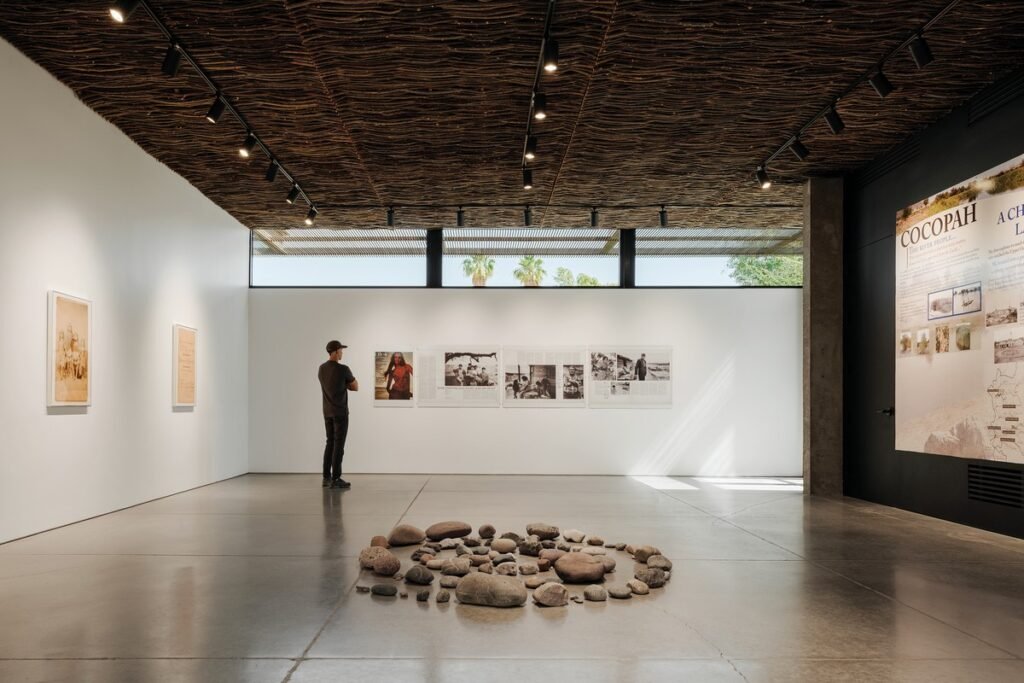 The new exhibition hall inside the Cocopah Museum lit by natural light shaping the visual experience.