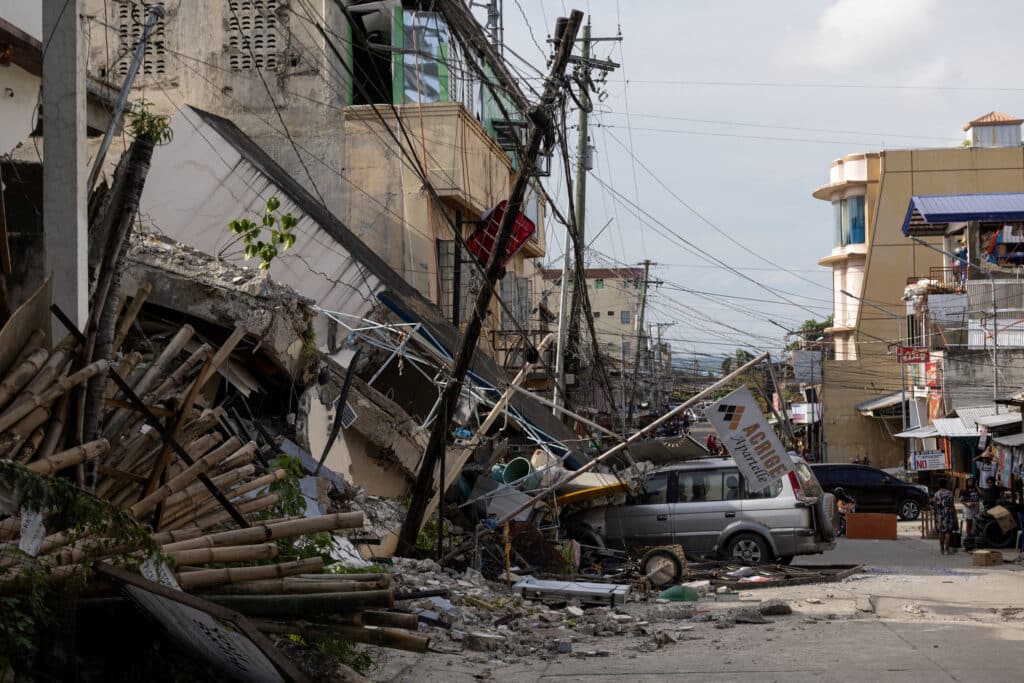 A damaged street showing collapsed buildings after the earthquake in southern Philippines