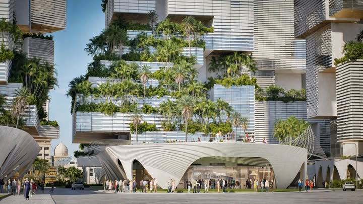 The Mayasem project&rsquo;s facade blends modern architecture with lush greenery &mdash; palm trees growing between floors, bringing nature into the urban fabric.