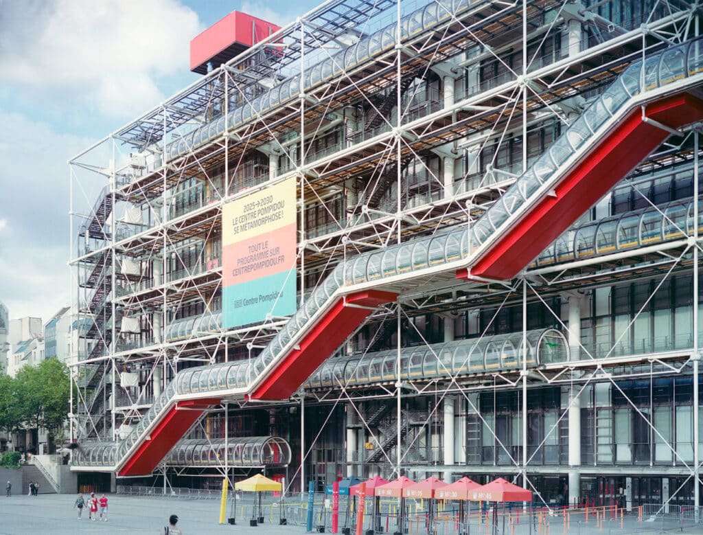 Centre Pompidou&rsquo;s red escalator and transformation banner (2025&ndash;2030).