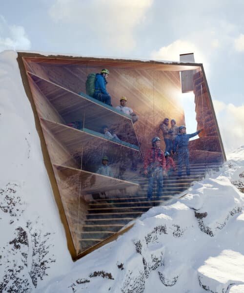 The mountain pavilion located on a high ridge among rocks and snow in the Alps