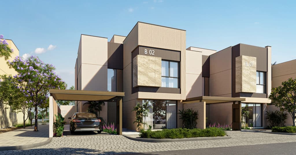 لقطة غروب في وجهة لازورد تُظهر واجهات الفلل بألوان دافئة تتماشى مع الإضاءة الطبيعية للمكان.