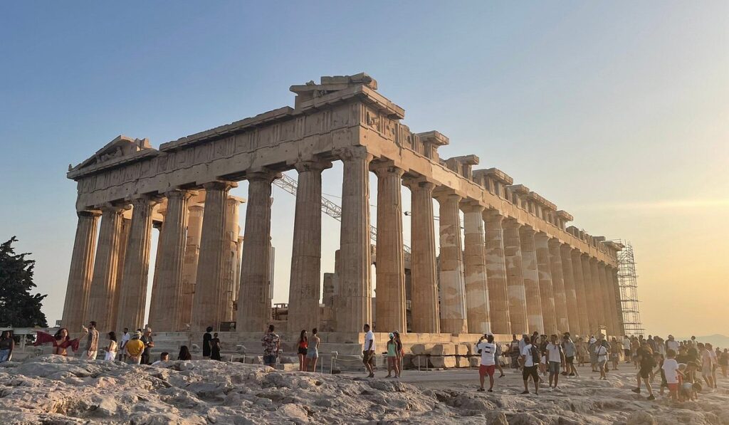 Different angle of the Parthenon showing modern restorations on the western facade and structural layout.