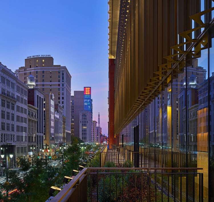 Facade of the main building at Hudson’s Detroit featuring glass, steel, and white-glazed terracotta