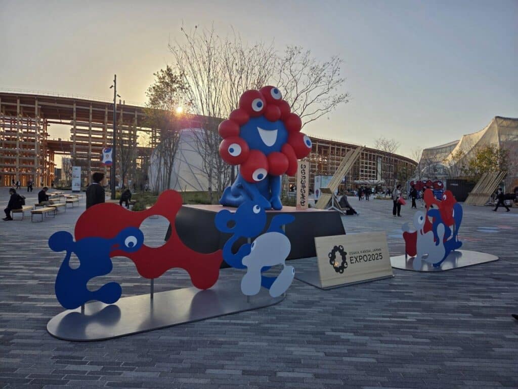 A wide view of Expo Osaka’s site showcasing dynamic layouts and open spaces that reflect Japan’s modern architectural thinking.