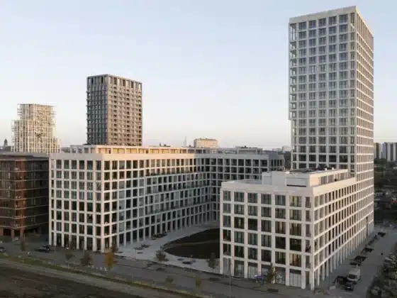 An aerial shot of the Cooperation Towers showing their harmony with Los Angeles&rsquo; urban landscape.