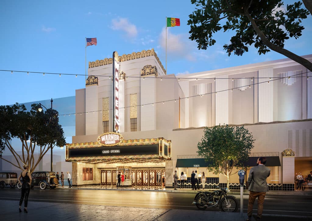 رسم تخطيطي للواجهة المُعاد تأهيلها لمسرح وارنر غراند في طراز آرت ديكو، يتوهج بإضاءة نيون ولافتات مضيئة. الناس يتجمعون خارج المبنى بينما تقف السيارات الكلاسيكية على الشارع، مما يعكس جو الافتتاح الكبير.