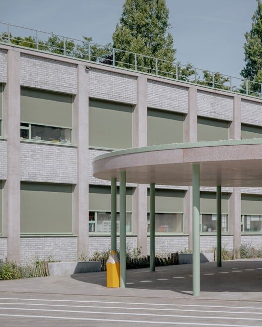 Chazal School renovated facade showing modern design with large windows and sustainable materials.