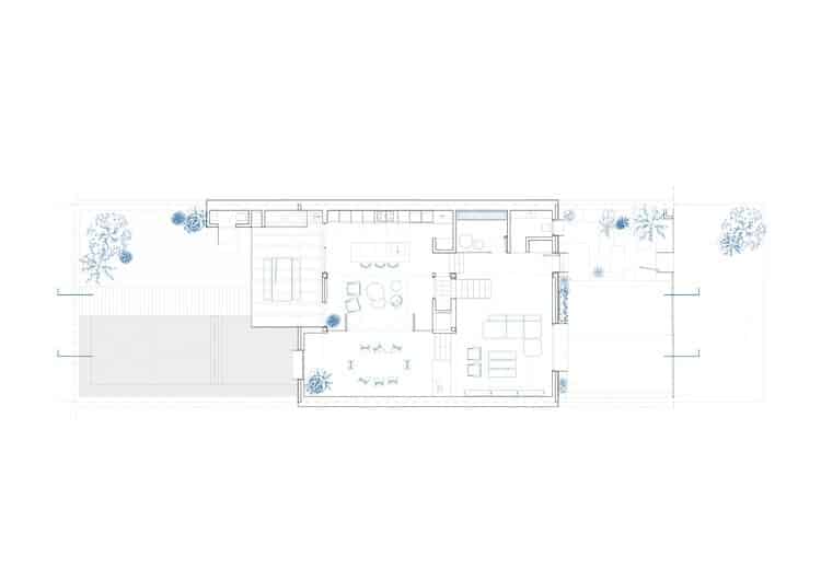 Front fa&ccedil;ade of Po-Yo House with exposed concrete box and metal frames around openings