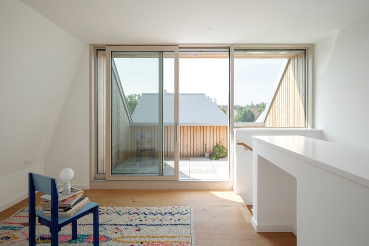 Overall view of Neubiberg residential quarter showing terraced buildings and green spaces