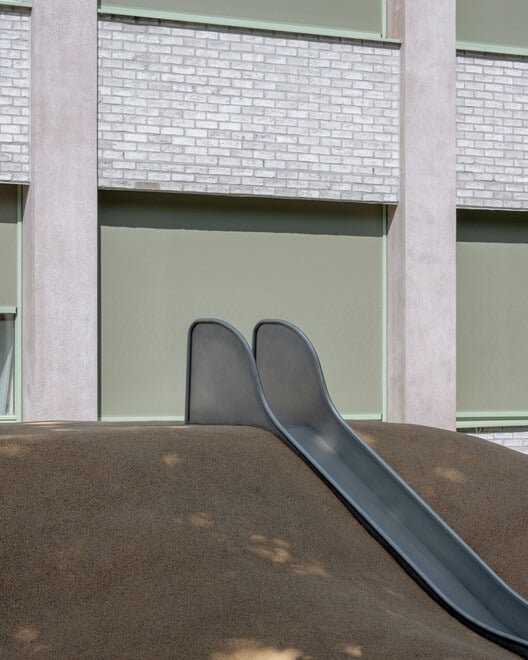 Chazal School renovated facade showing modern design with large windows and sustainable materials.