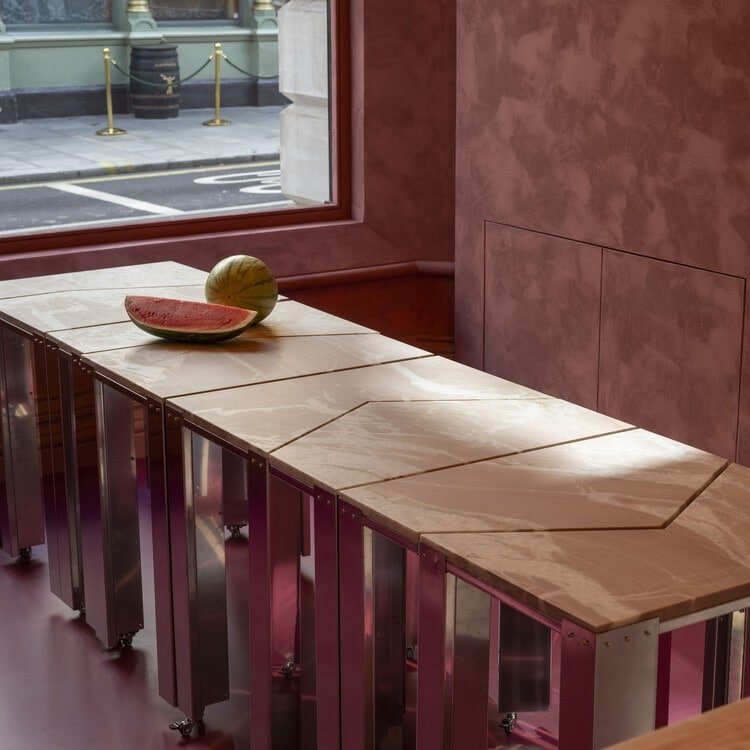 Exterior view of Ibraaz building showcasing modern architecture and cultural interaction