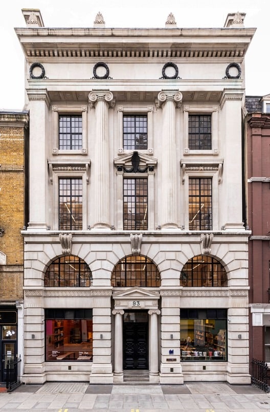 Exterior view of Ibraaz building showcasing modern architecture and cultural interaction