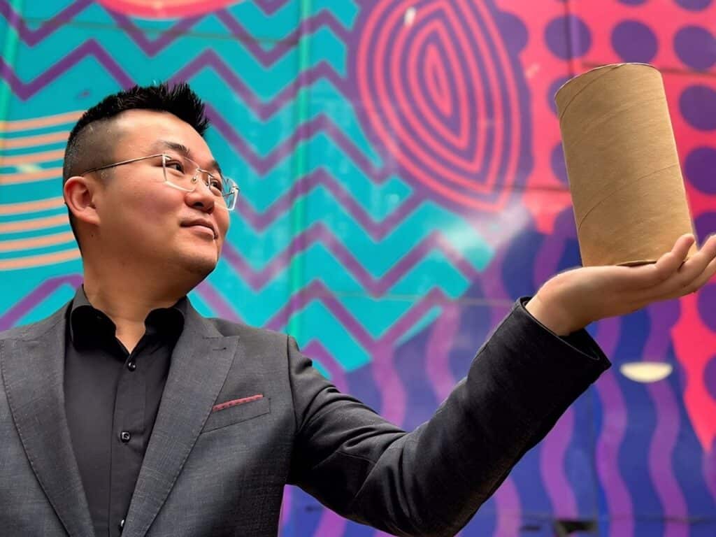 Compressed soil inside cardboard tubes forming sustainable CCRE material