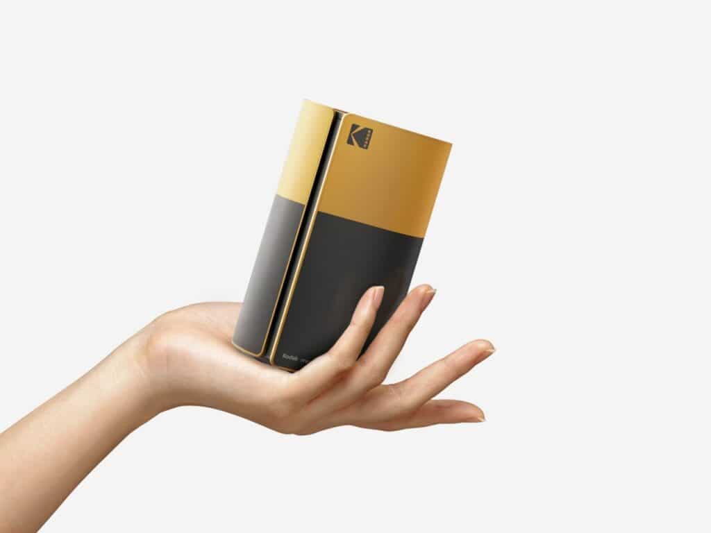 Analog film camera with classic yellow and black design