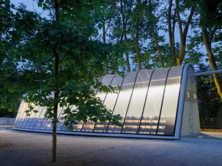 La Libreria mobile library resembling a greenhouse, surrounded by visitors
