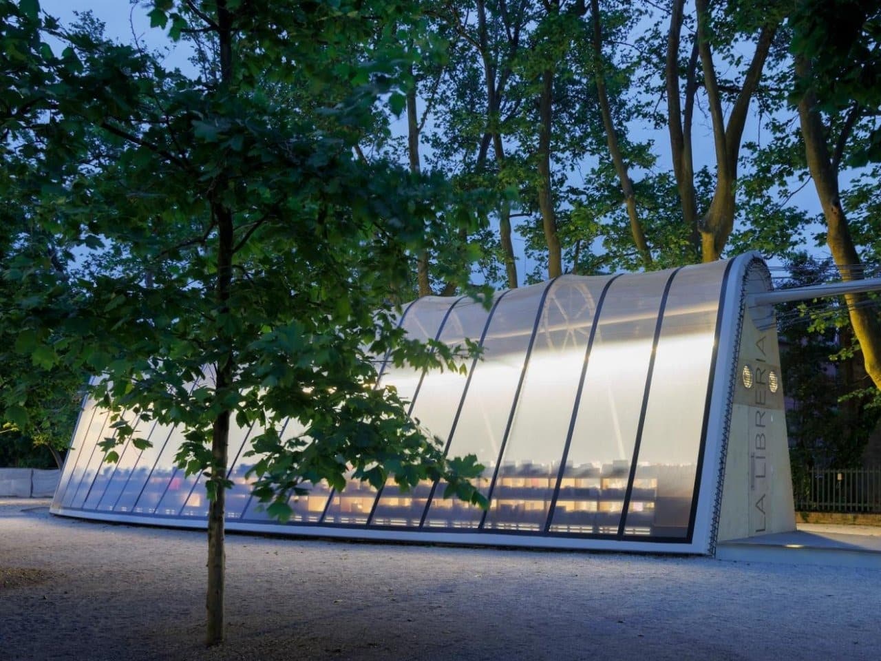 La Libreria mobile library resembling a greenhouse, surrounded by visitors