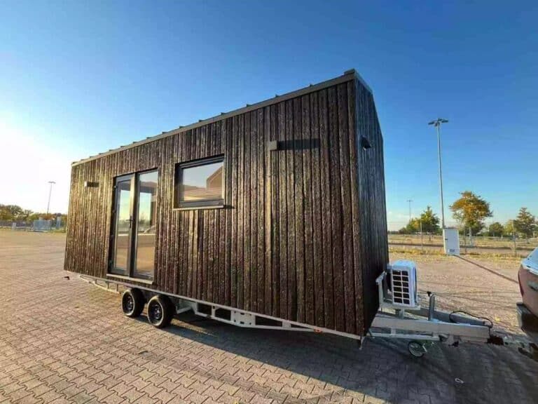 BTH Single tiny house exterior on trailer, compact wooden design