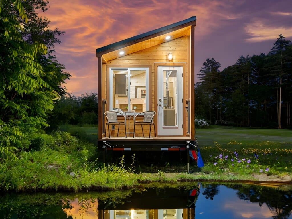 Exterior view of Little Lodge tiny home with wood and metal facade