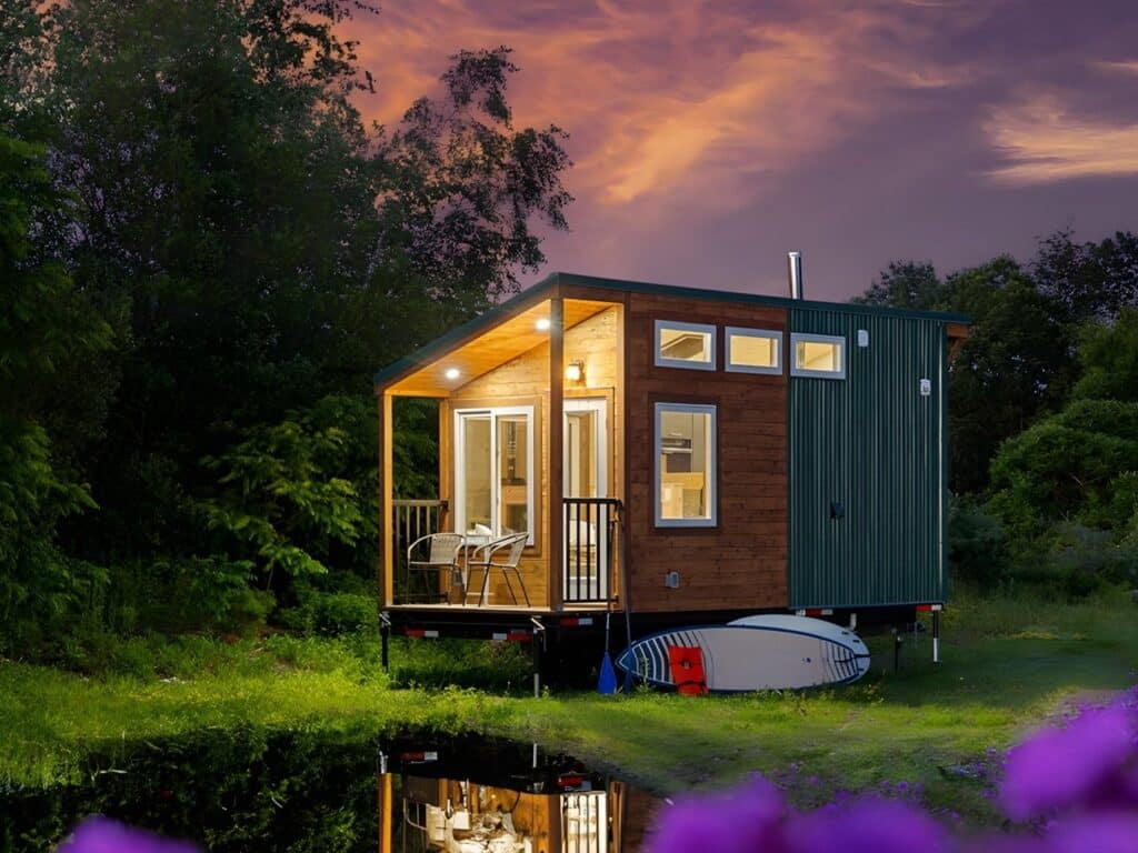 Exterior view of Little Lodge tiny home with wood and metal facade