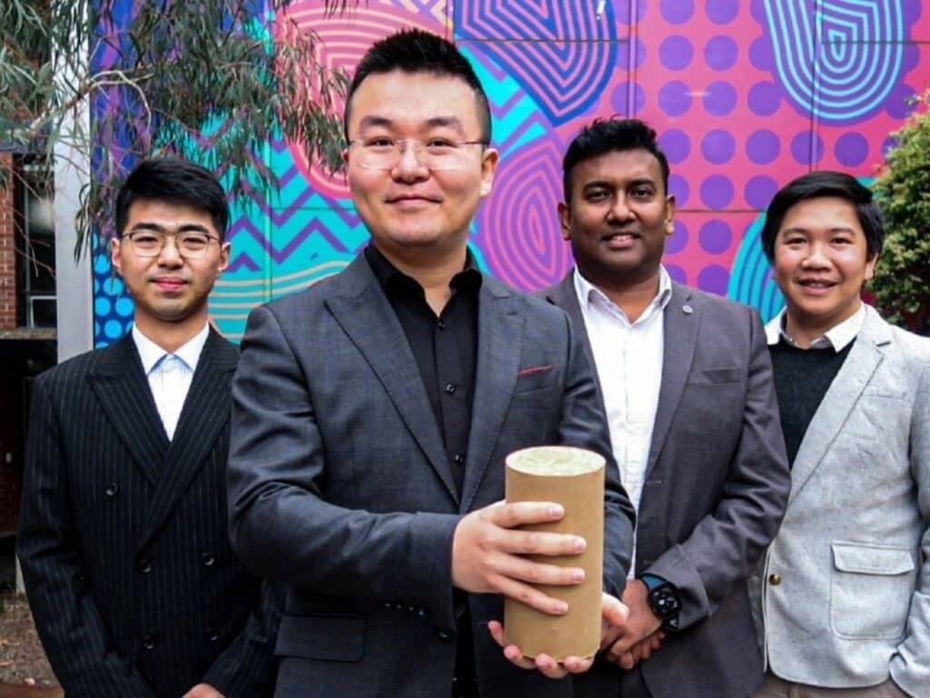 Compressed soil inside cardboard tubes forming sustainable CCRE material