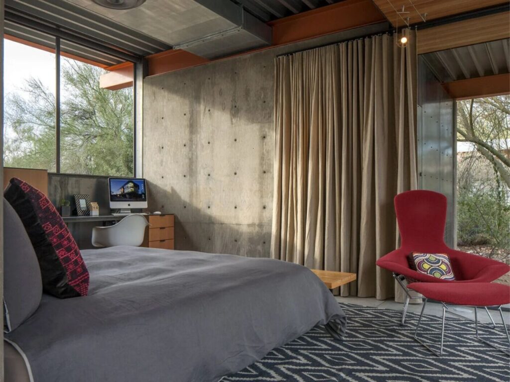 Renovated guest house in the Phoenix desert, blending heritage and modern architecture with minimalist interiors, natural materials, and landscaped outdoor spaces.