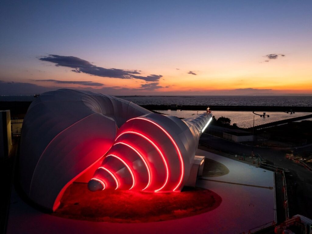 Pasona Natureverse pavilion shaped like a giant ammonite at Expo 2025