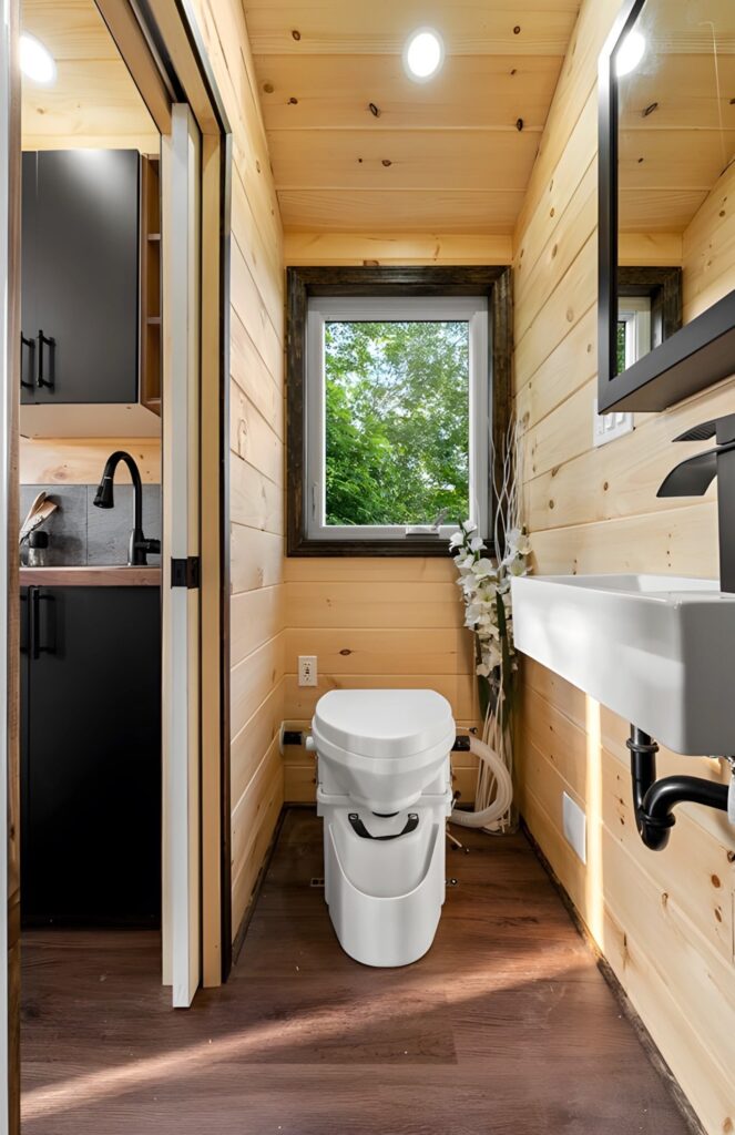 Exterior view of Little Lodge tiny home with wood and metal facade