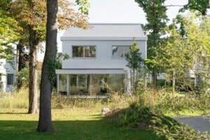Overall view of Neubiberg residential quarter showing terraced buildings and green spaces