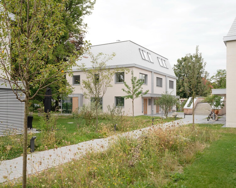 Overall view of Neubiberg residential quarter showing terraced buildings and green spaces