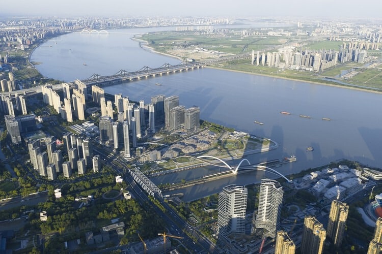 Grand Canal Gateway Bridge in Hangzhou with views of Qiantang River and surrounding urban environment