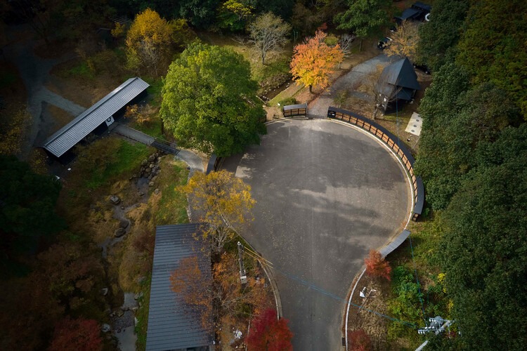 Design and layout of a sauna balancing privacy, social interaction, and integration with nature