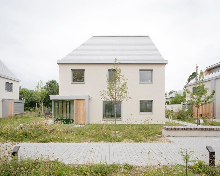 Overall view of Neubiberg residential quarter showing terraced buildings and green spaces