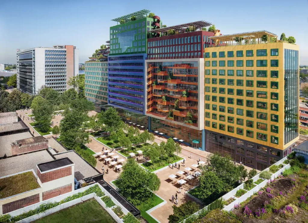 Vibrant color mosaic harmonizes with green park and blue sky.