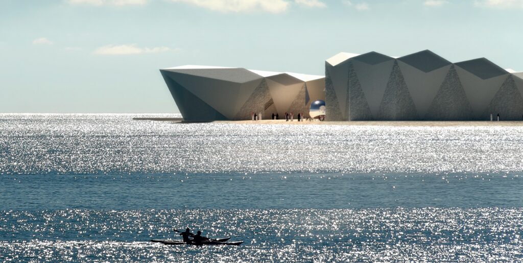 مبنى هندسي يبرز من البحر، ويعكس ضوء الشمس في تدرج أزرق ساحر.