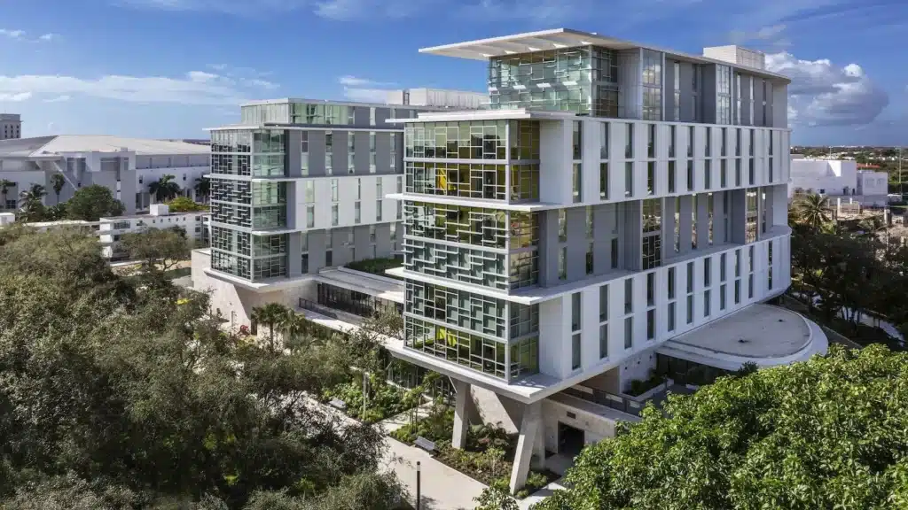 Glass façades inviting natural light while revealing students’ daily movement