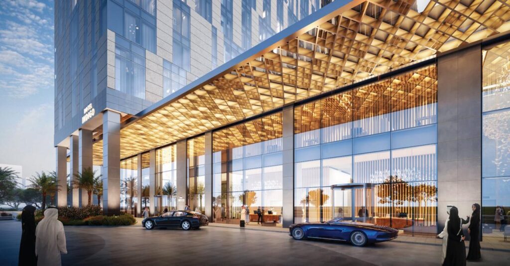 Hotel Miraf entrance, Khobar  modern luxury meets local identity with a glowing canopy and glass facade.
