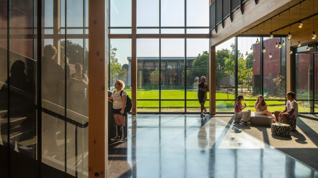 Quiet seating near large windows offering visual connection with the surrounding landscape.