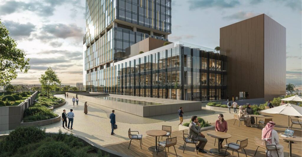 A vibrant mixed use plaza in Miraf District, Khobar blending office towers, green pathways, and outdoor seating under a soft evening sky.