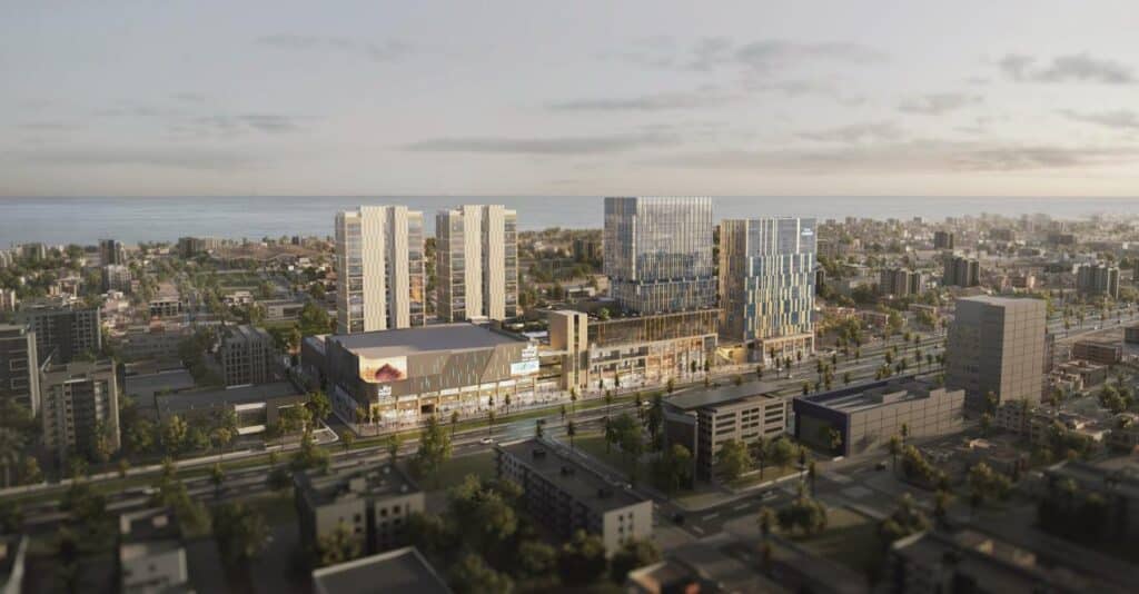 Aerial view of Miraf District, Khobar   modern towers and retail hubs nestled between the city and the sea.