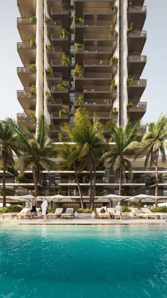 The central pool surrounded by shaded gardens and recreation spaces within Rise by Athlon